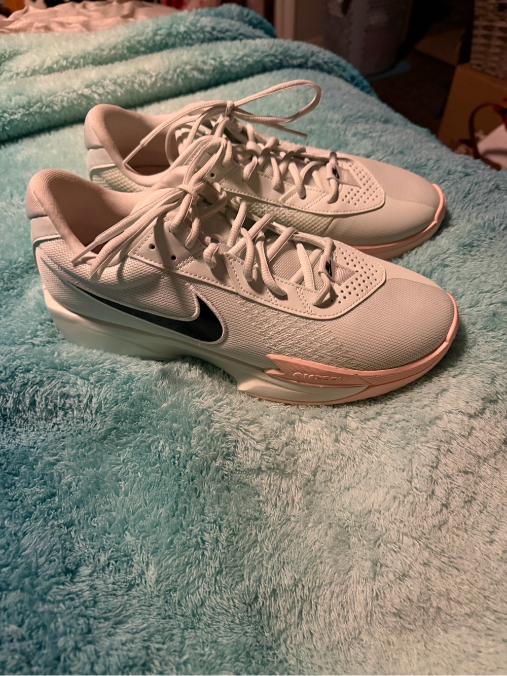 Nike Women's White and Light Pink Training Sneakers with Black Swoosh